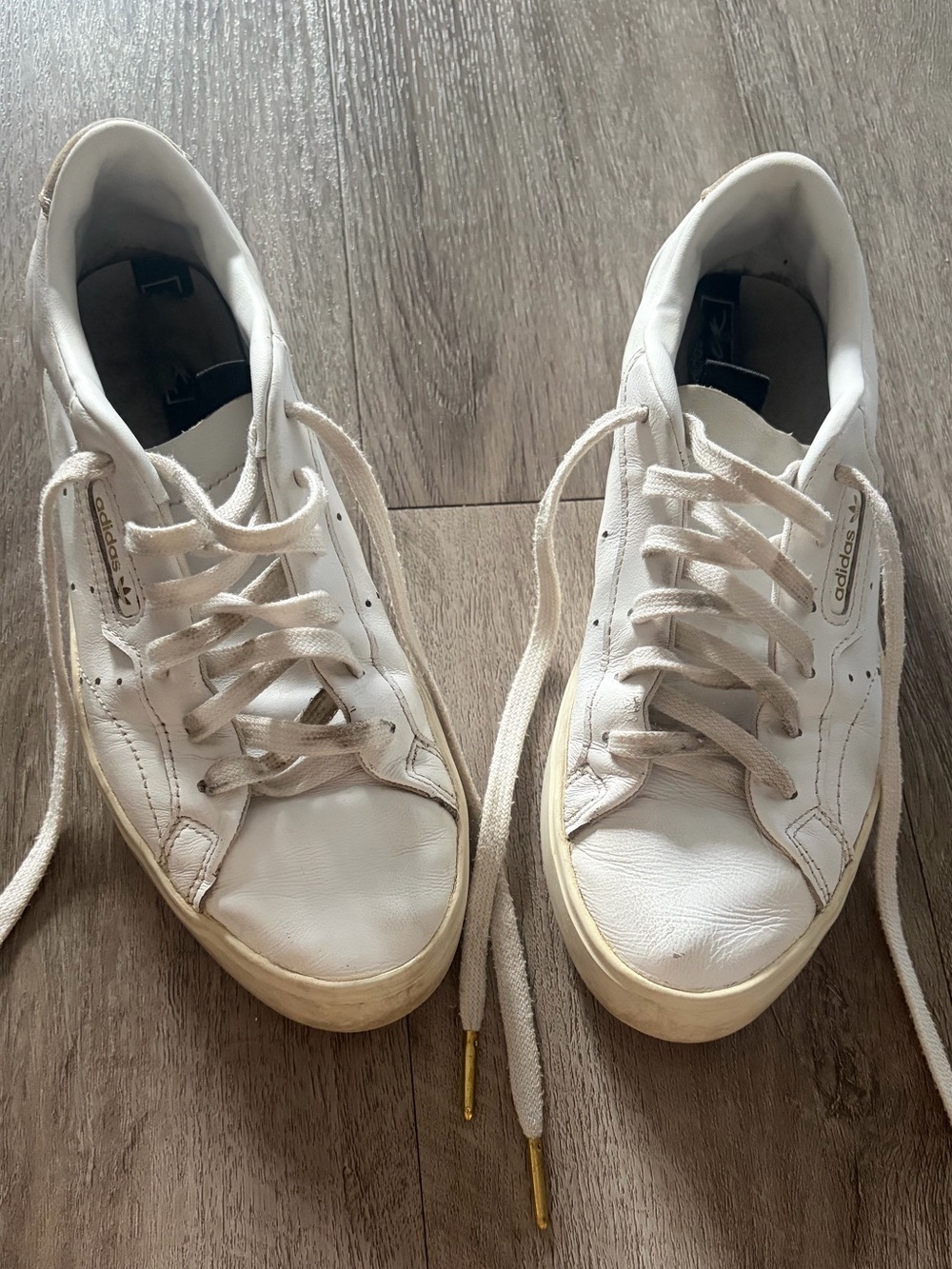 adidas Women's White sleek sneakers